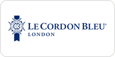 Logo of le cordon bleu london featuring a blue crest with cooking symbols, flanked by the name in elegant typography.