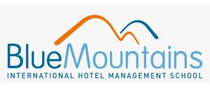 Logo of Blue Mountains International Hotel Management School featuring stylized blue mountain peaks above the name in orange and blue fonts.